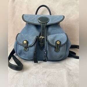 Dooney & Bourke Vintage Canyon Backpack in blue denim. 10.5”x 9.25”x 4”